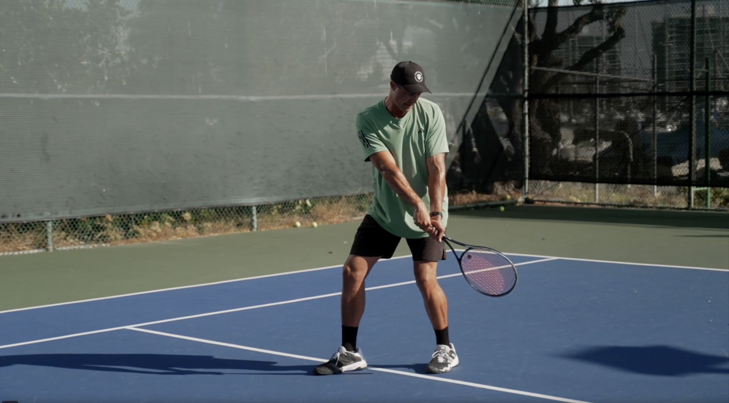 The Two-Handed Backhand Swing: Racket Drop to Follow-Through
